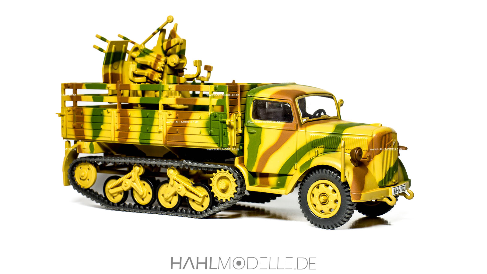 Opel Blitz 3 to Sd.Kfz. 3a, „Maultier“, Pritsche mit Flak, beige-grün-braun, Ixo, hahlmodelle.de